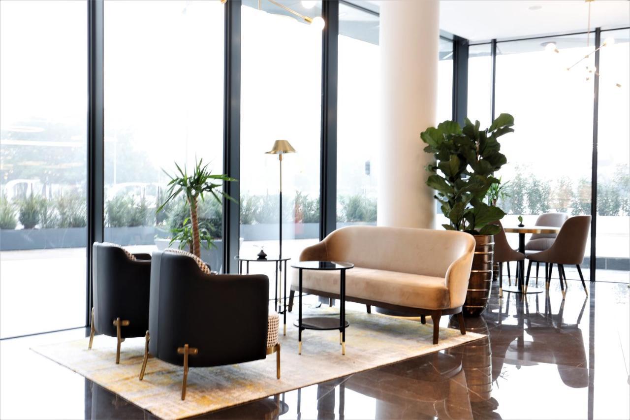Grand Plaza Hotel & Congress Center Lubiana Esterno foto The lobby of the hotel